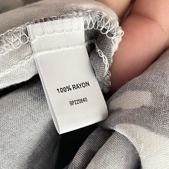 Cute Flowy Mini Skirt Size M Smocked Waist Semi Shark Bite Hem Black White - Picture 6 of 8